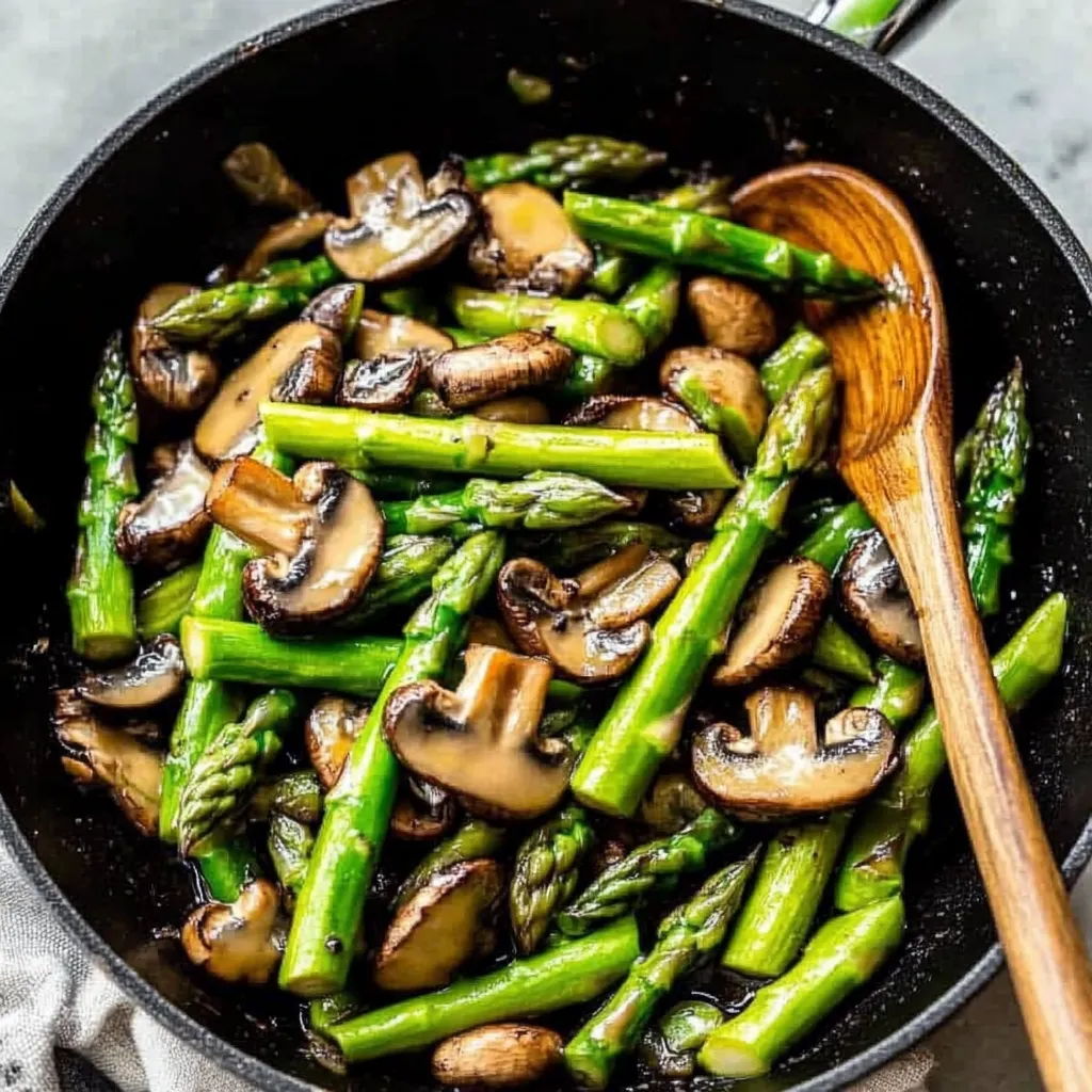 Close_up Of a Sauteed Asparagus and Mushrooms