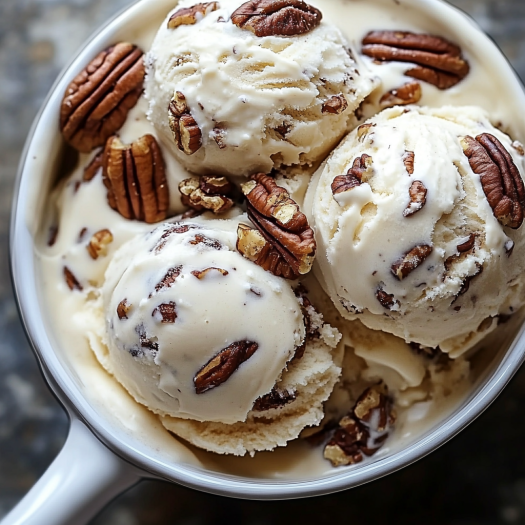 A bowl of homemade butter pecan ice cream.