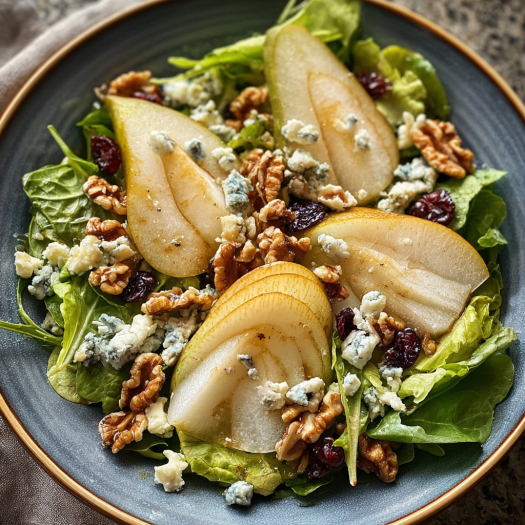 A plate of Barefoot Contessa Pear and Blue Cheese Salad.