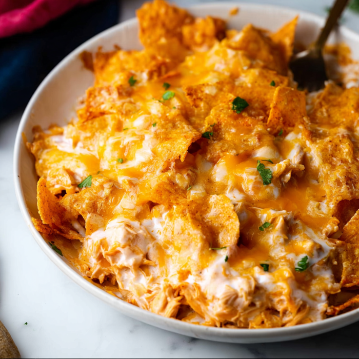 Cheesy chicken nachos in a bowl, just waiting for you.