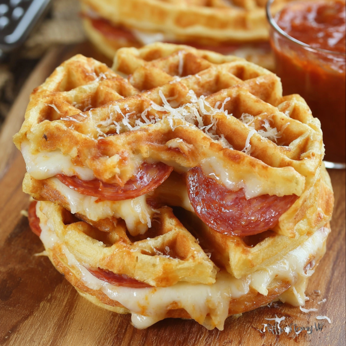 Crispy pizza-filled waffle oozing cheese and tangy tomato.