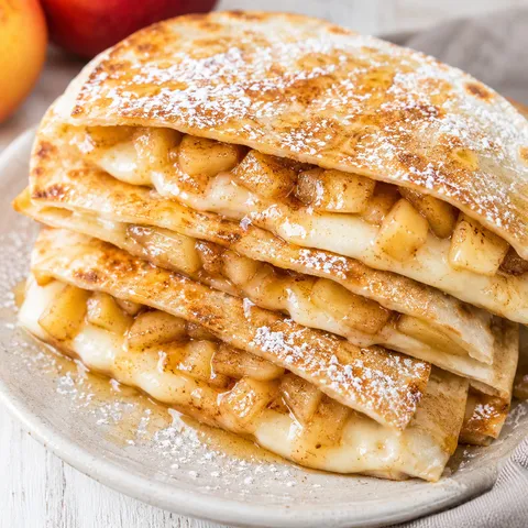 Apple cinnamon breakfast quesadilla wedges with cream cheese filling