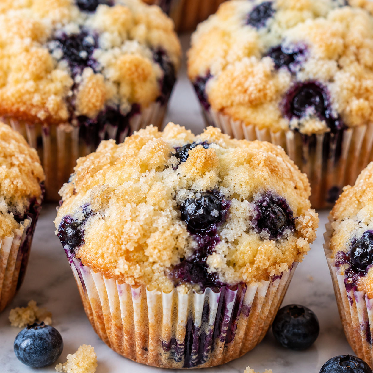 Blueberry muffins with crunchy streusel topping and juicy berries