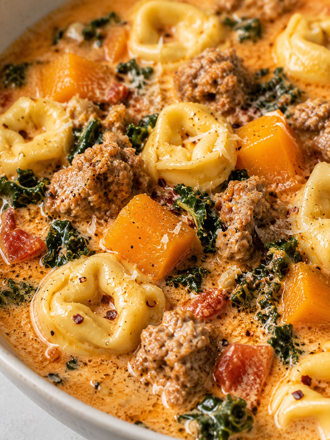 Butternut Squash Sausage Tortellini Soup, plated and served