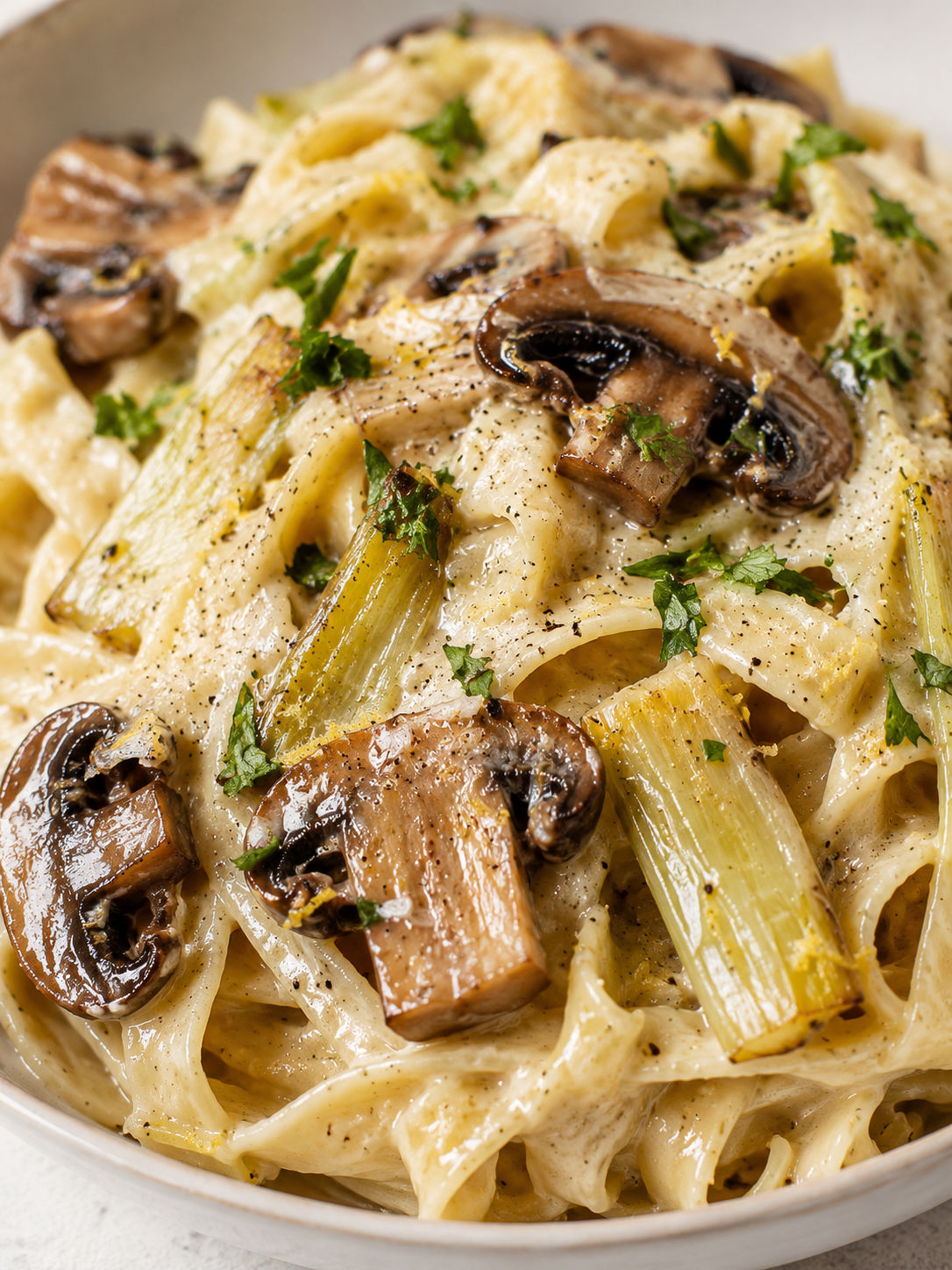 Caramelized Leek and Mushroom Gruyere Pasta, plated and served
