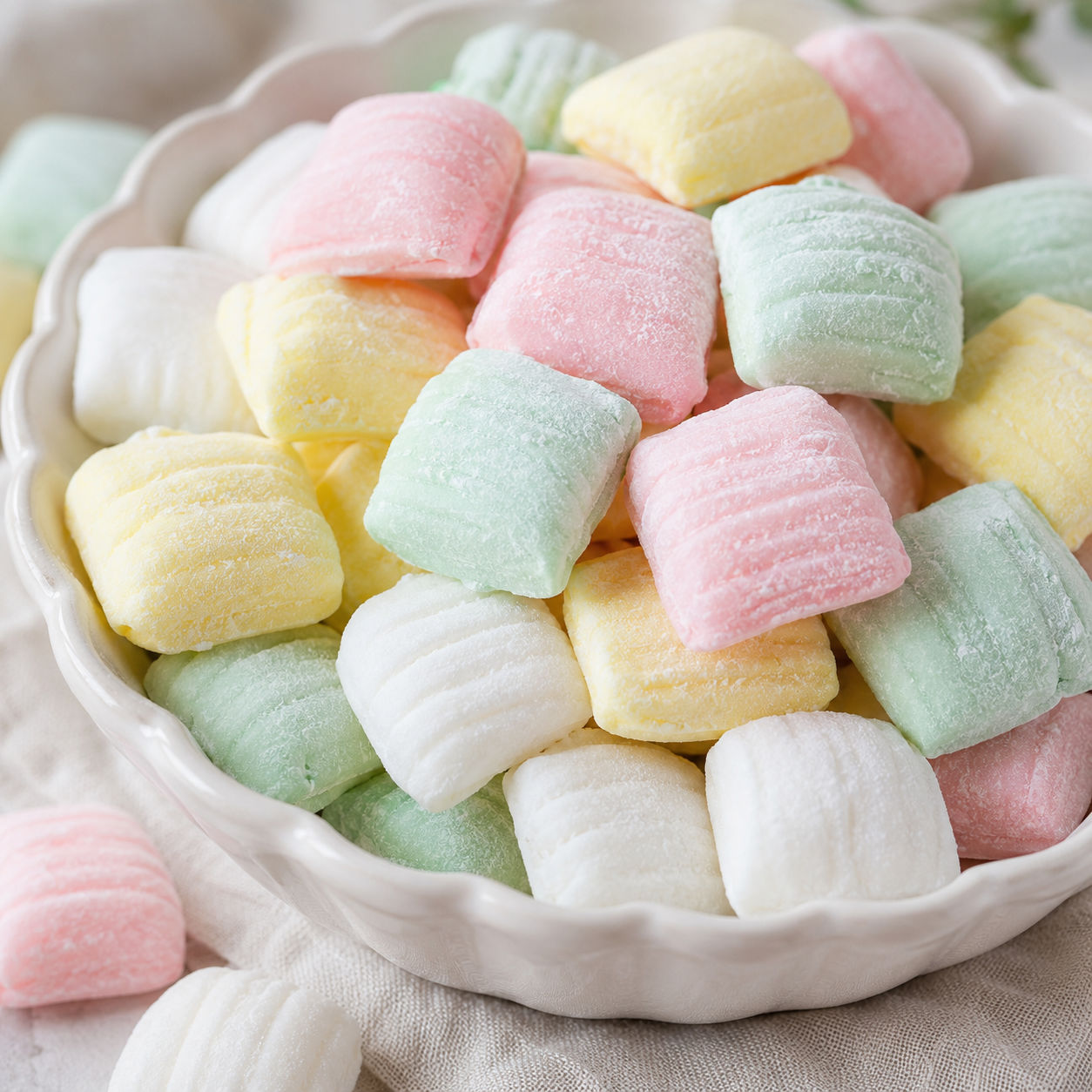 Pastel Classic Butter Mints in a white candy dish