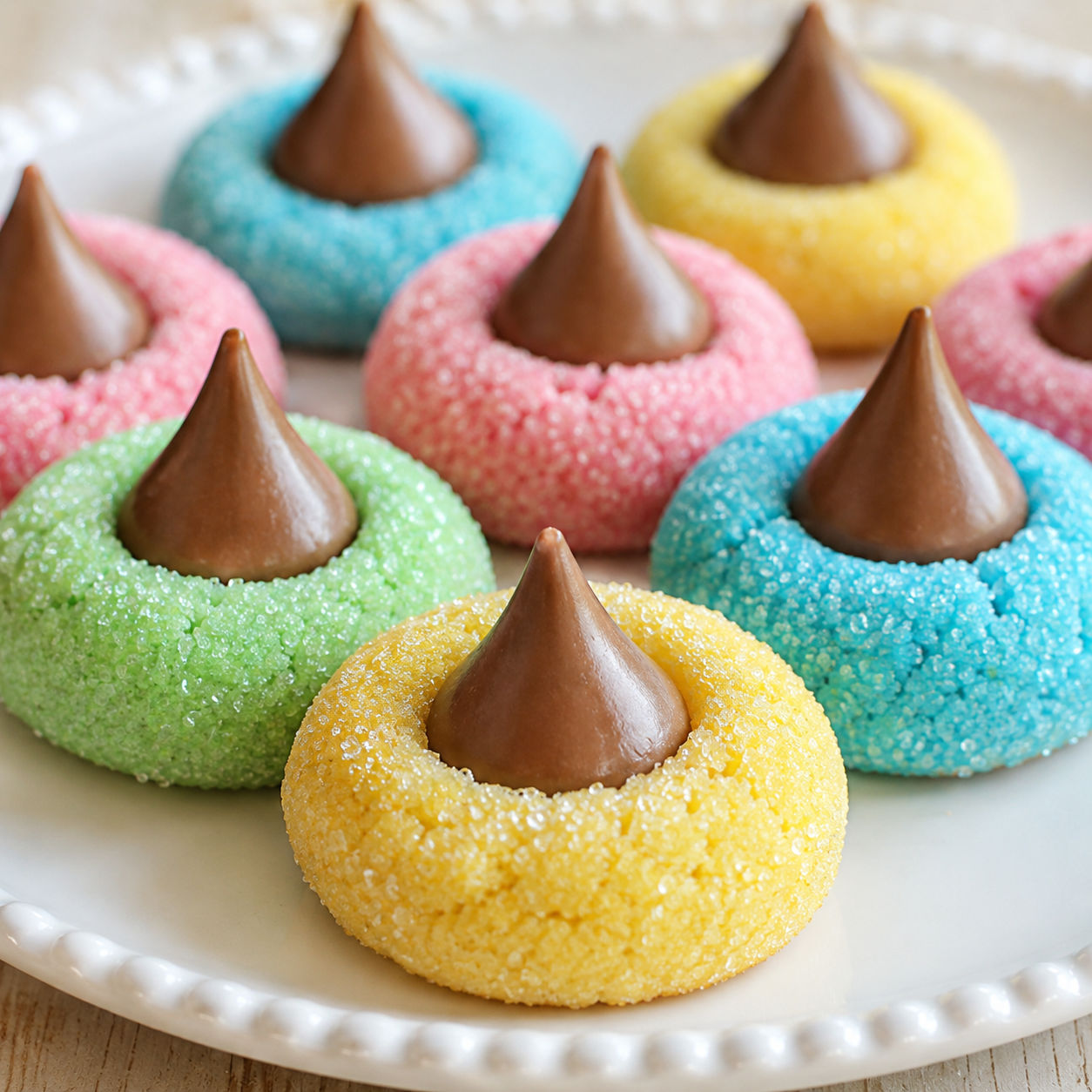 Colorful Hershey Kiss Cookies with sanding sugar and chocolate centers
