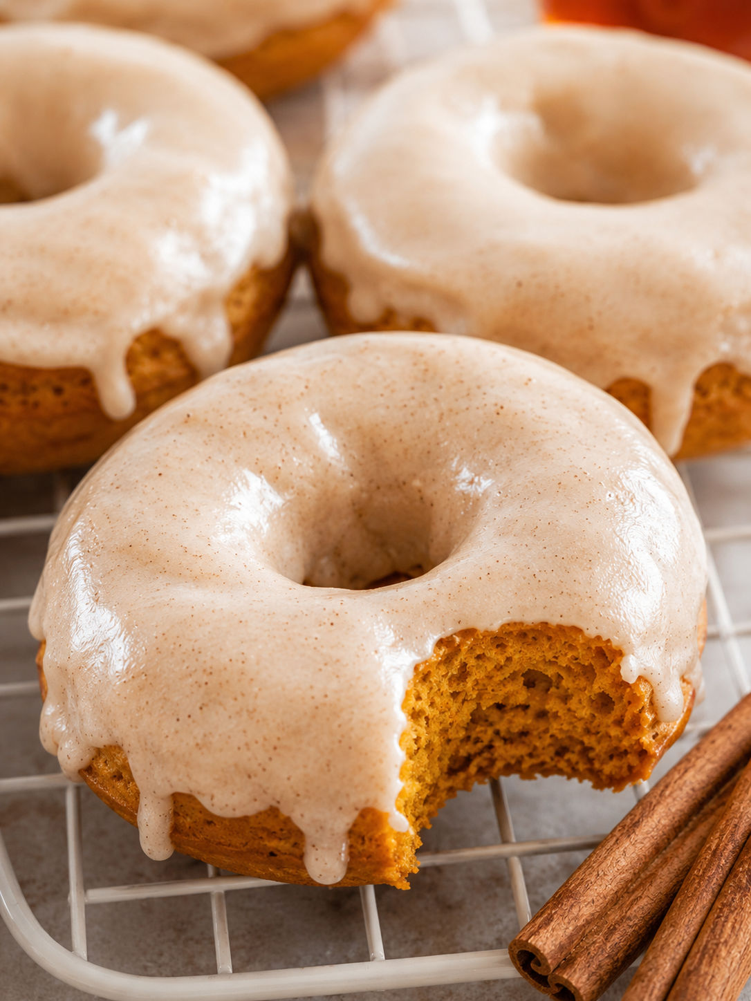 Delicious Baked Pumpkin Donuts with Maple Glaze, plated and served