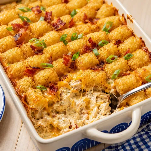 Chicken bacon ranch tater tot casserole with bacon and scallions