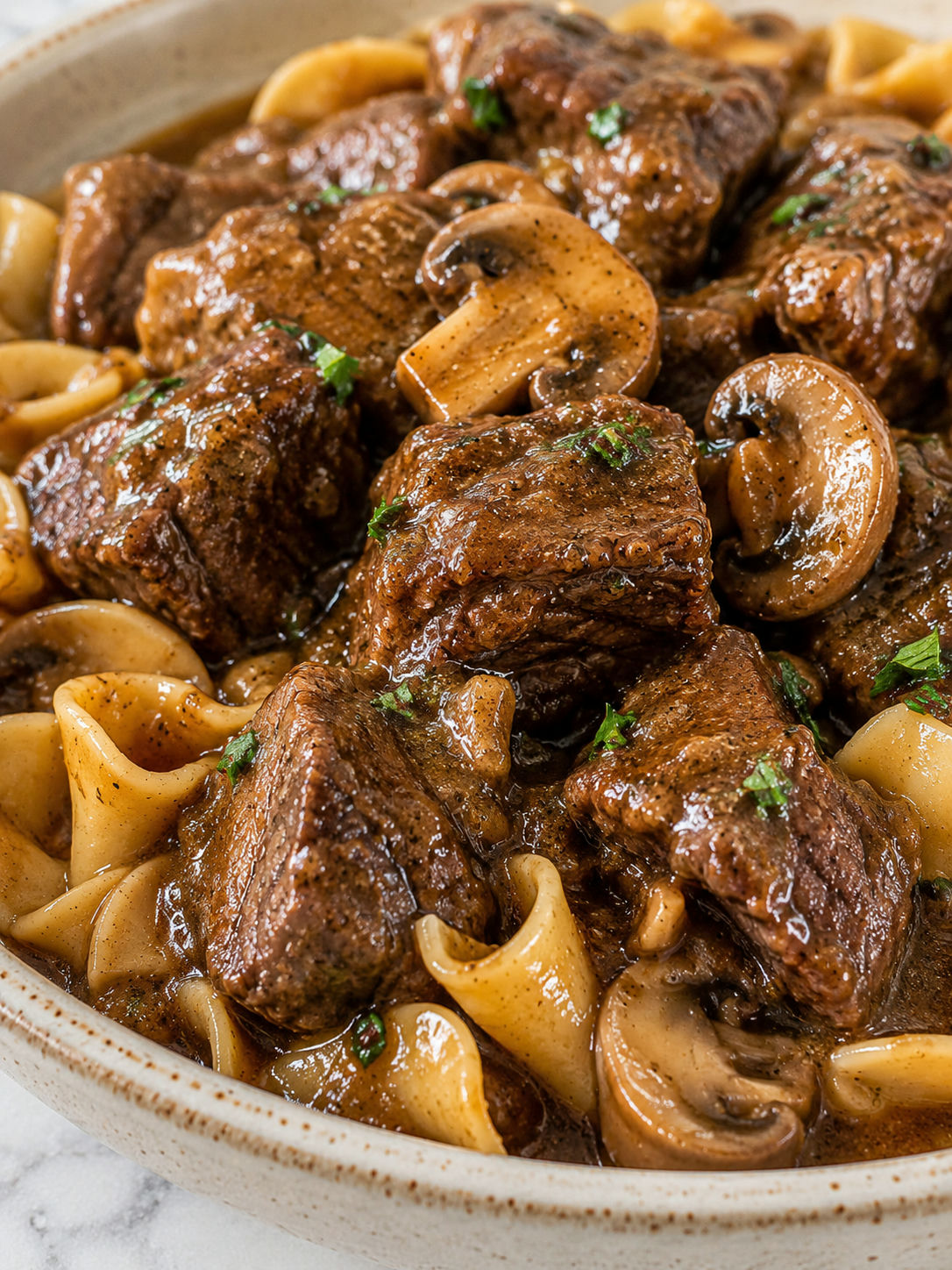 Delicious Crockpot Beef Tips & Noodles, plated and served