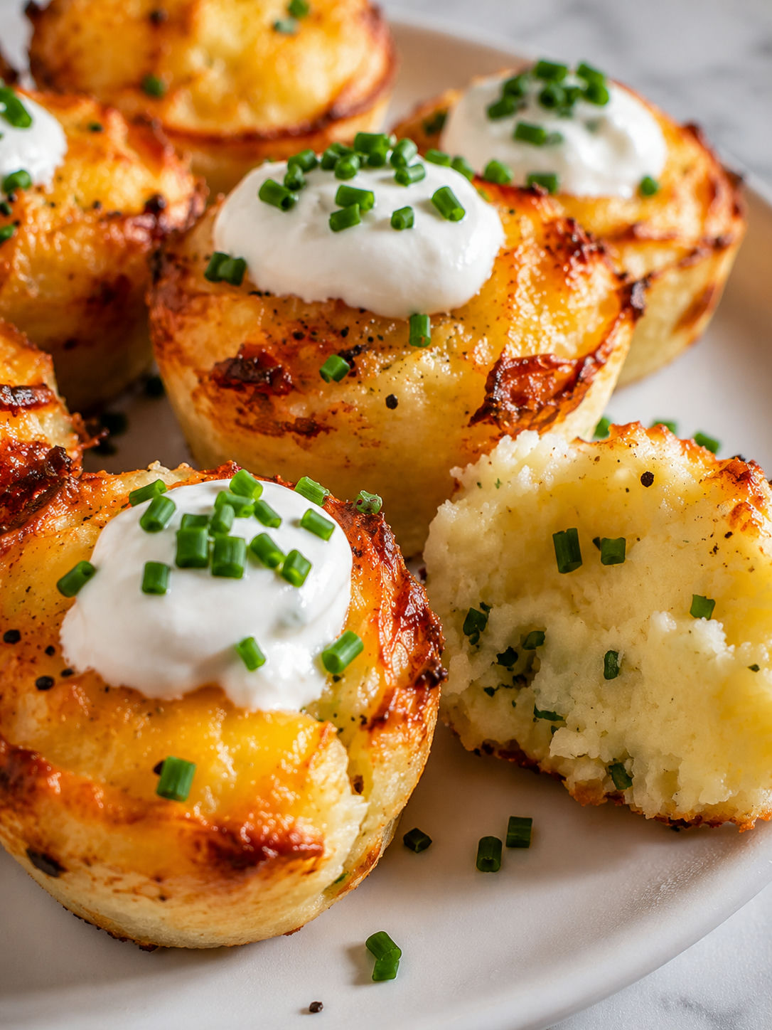 Delicious Garlic Chive Mashed Potato Puffins, plated and served