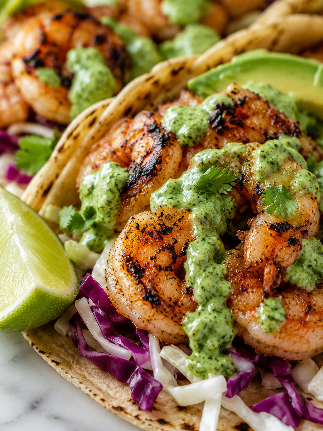 Delicious Grilled Shrimp Tacos with Cilantro Sauce, plated and served