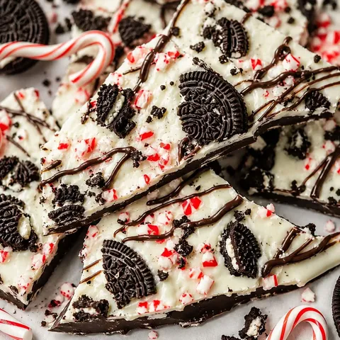 Peppermint Oreo bark with crushed candy canes and chocolate drizzle