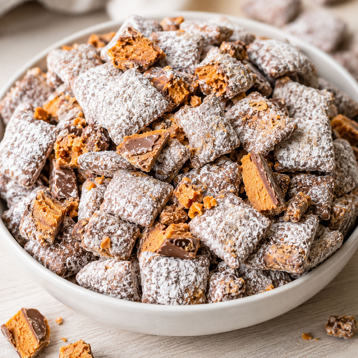 Butterfinger puppy chow with powdered Chex cereal and candy pieces