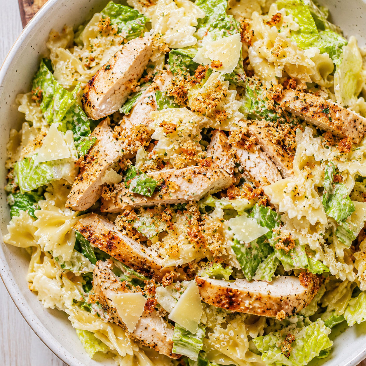Chicken Caesar pasta salad with garlic breadcrumbs and parmesan