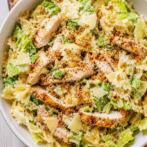 Chicken Caesar pasta salad with garlic breadcrumbs and parmesan