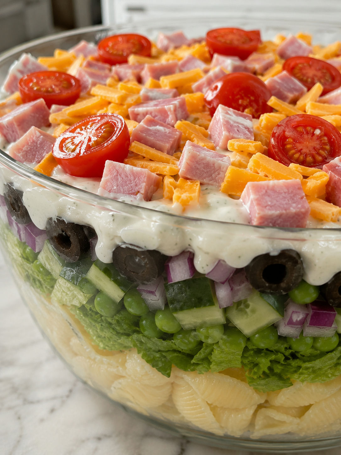 Easy Layered Pasta Salad, plated and served