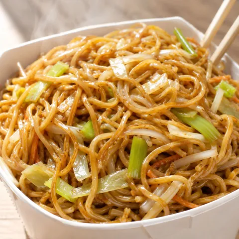 Panda Express copycat chow mein with cabbage and celery in a white bowl