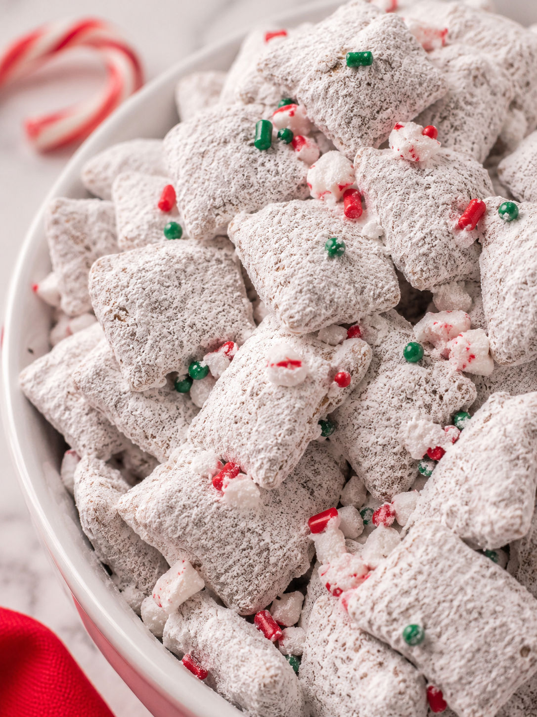 Festive Holiday Peppermint Candy Cane Puppy Chow, plated and served