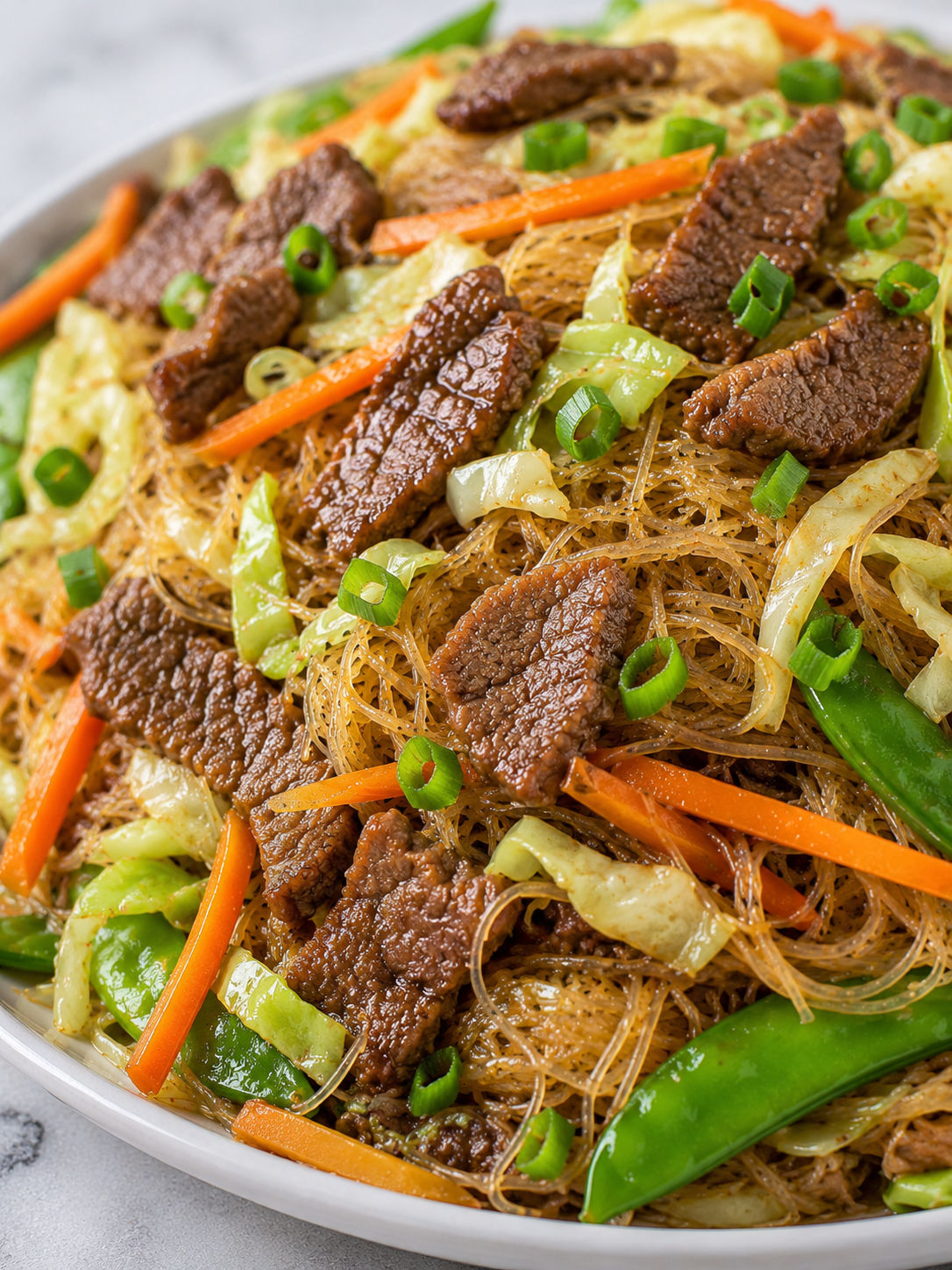 Filipino Pancit with Beef, plated and served