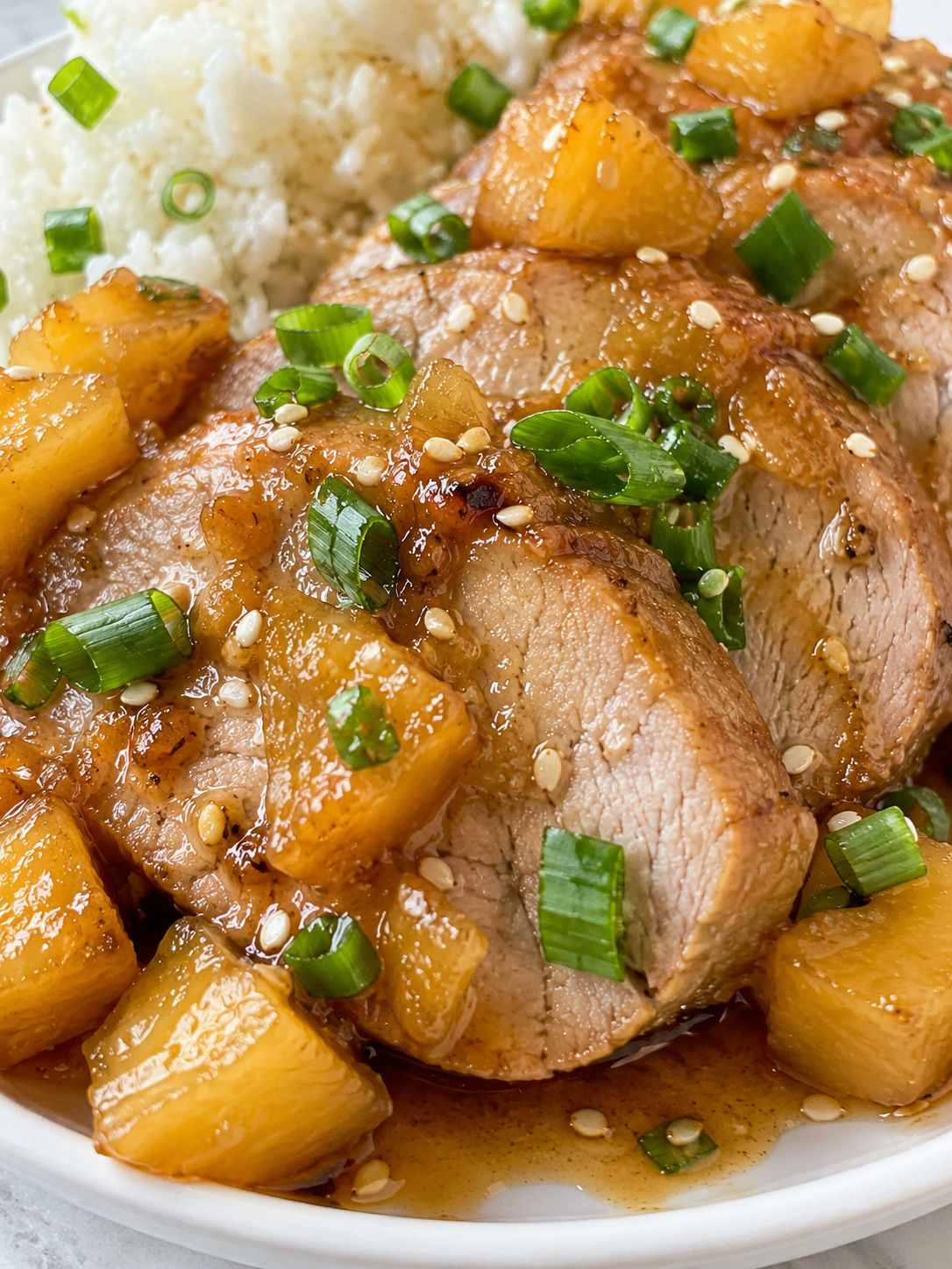 Flavorful Slow Cooker Pineapple Pork Loin, plated and served