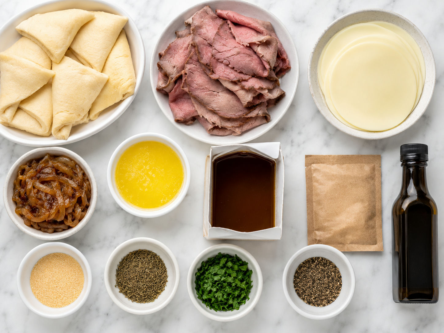Ingredients for French Dip Bites with roast beef, provolone, and au jus