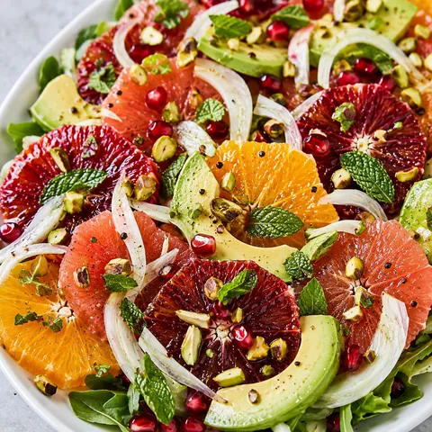 Fresh winter citrus salad with fennel, avocado, mint, and pomegranate