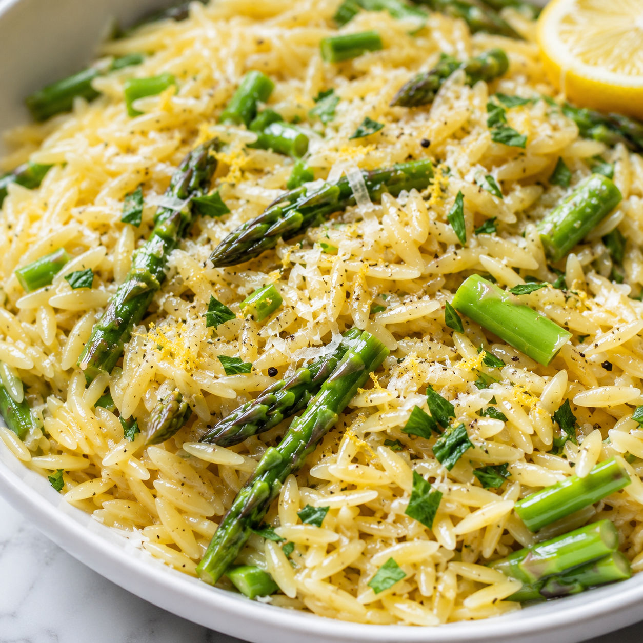 Garlic butter asparagus orzo with Parmesan, parsley, and lemon