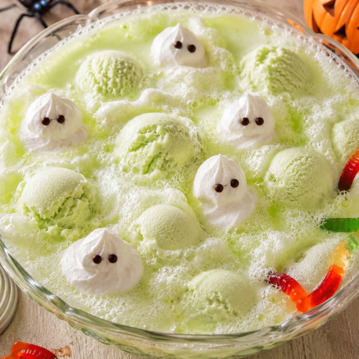 Ghostly Halloween Punch with lime sherbet foam and whipped cream ghosts