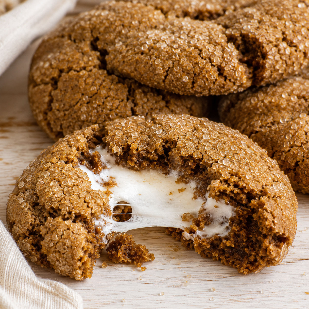 Molasses marshmallow stuffed cookies with a gooey center