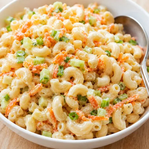 Creamy Hawaiian BBQ macaroni salad with carrot and green onion