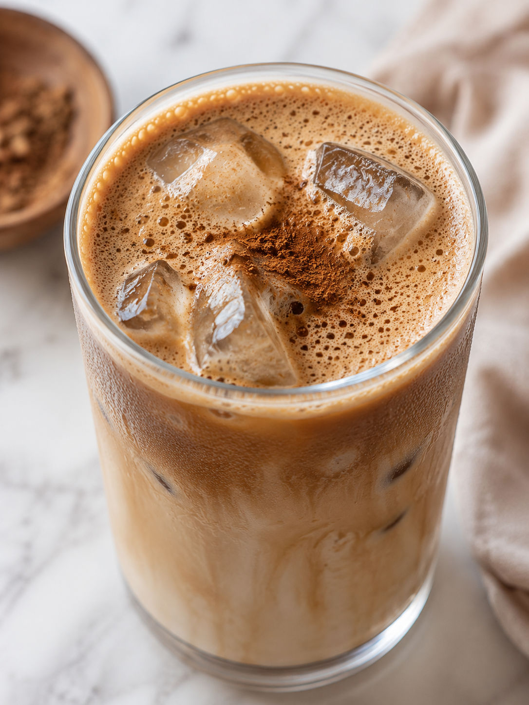 Iced Brown Sugar Oat Milk Shaken Espresso, plated and served