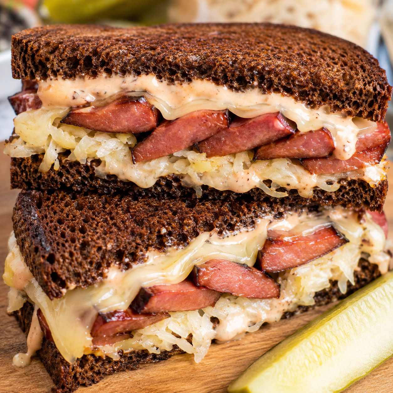 Kielbasa Reuben sandwich with sauerkraut, Swiss cheese, and rye bread
