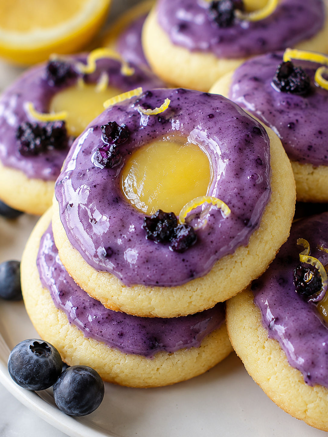 Lemon-Filled Cookies with Blueberry Icing, plated and served