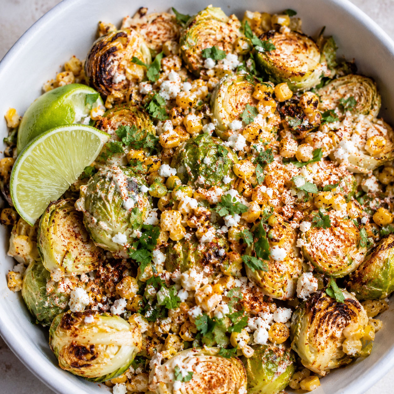 Mexican Street Corn Brussels Sprouts with Cotija, cilantro, and lime