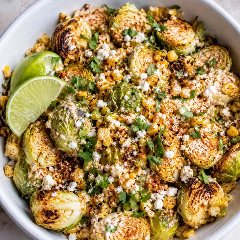 Mexican Street Corn Brussels Sprouts with Cotija, cilantro, and lime