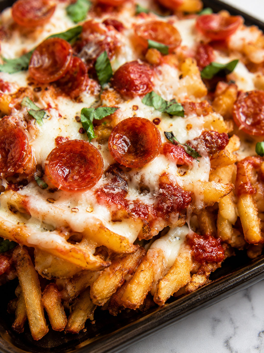 Pizza Fries, plated and served