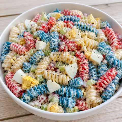 Red white and blue pasta salad with eggs and creamy dressing