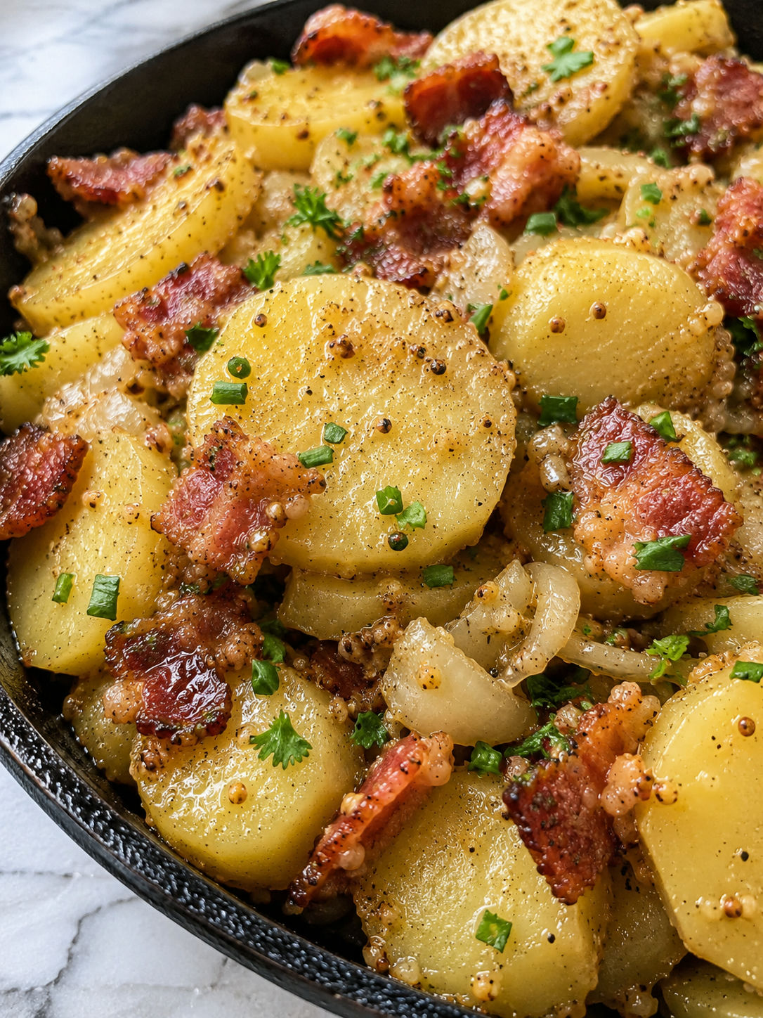 Savor The Authentic Taste Of German Potato Salad Today, plated and served