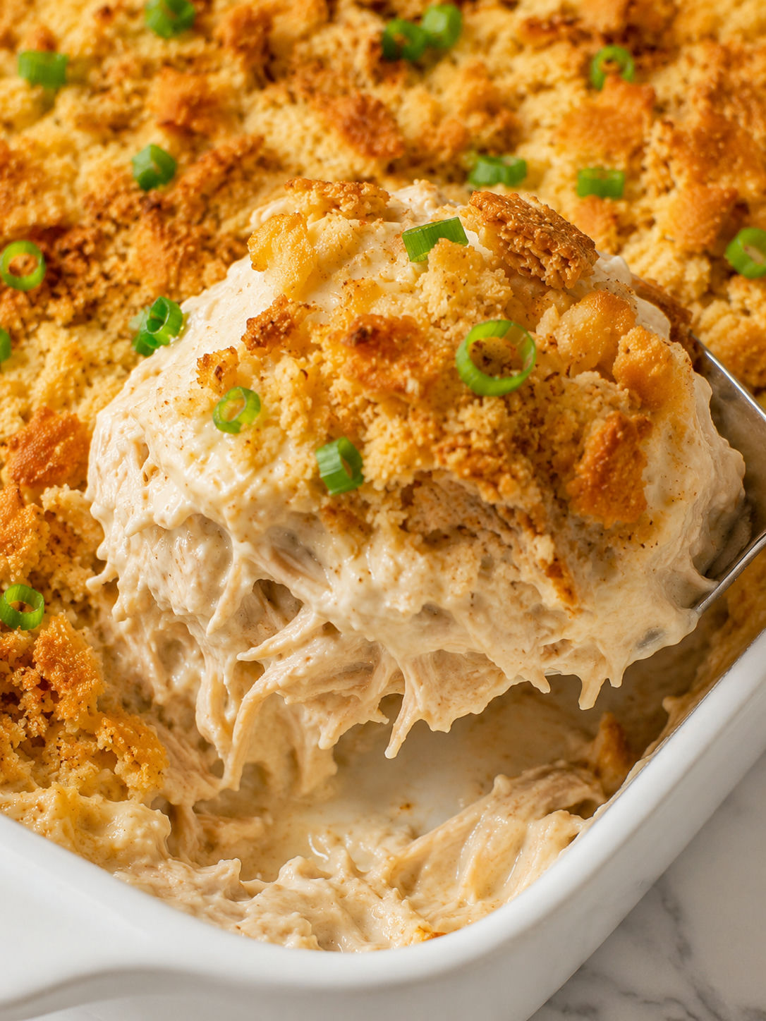 Savor The Richness: Million Dollar Chicken Casserole, plated and served