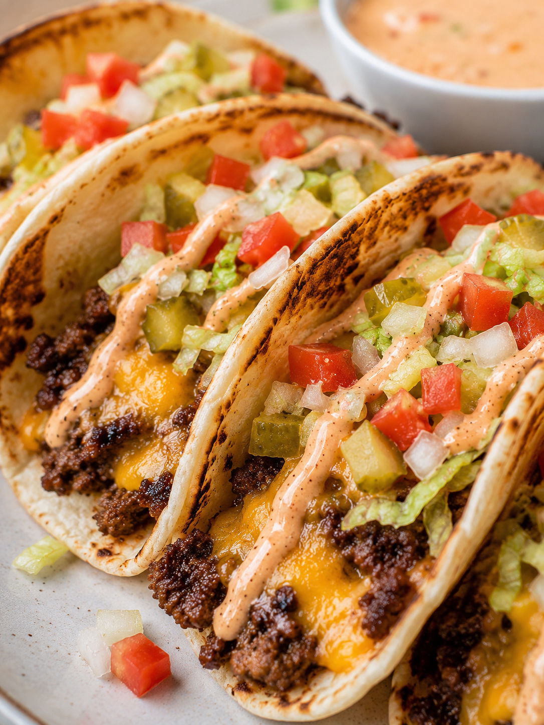 Smashed Cheeseburger Tacos, plated and served