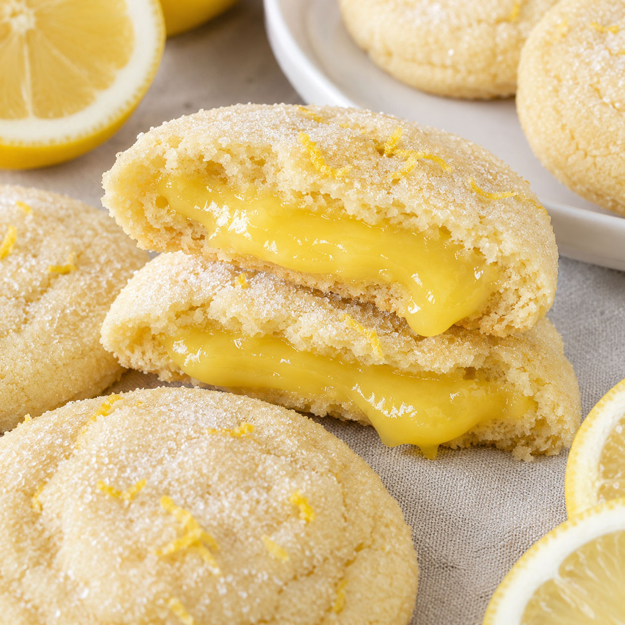 Stuffed lemon cookies with glossy lemon curd centers and sugar crust
