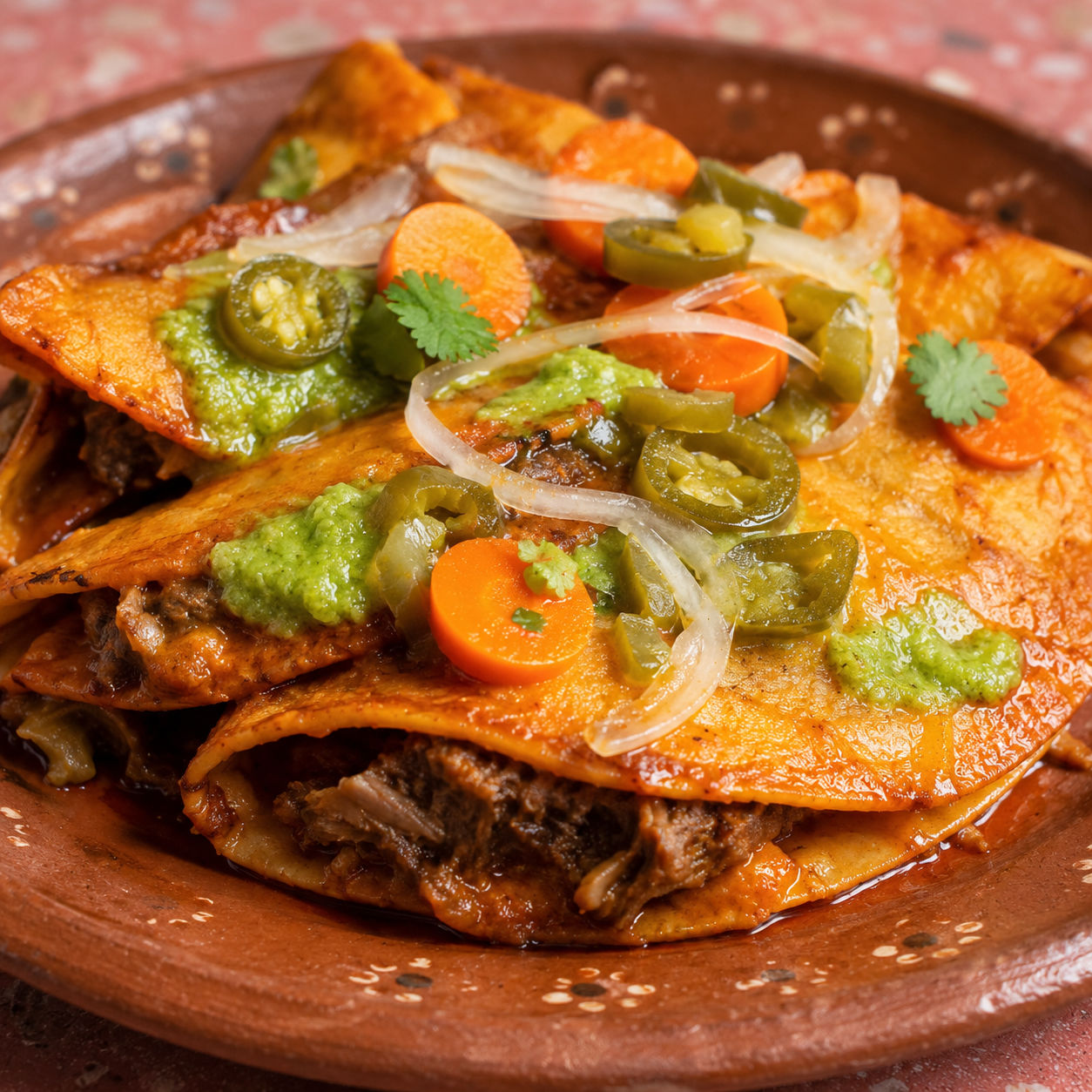 Tacos de canasta with salsa verde, pickled jalapenos, and carrots