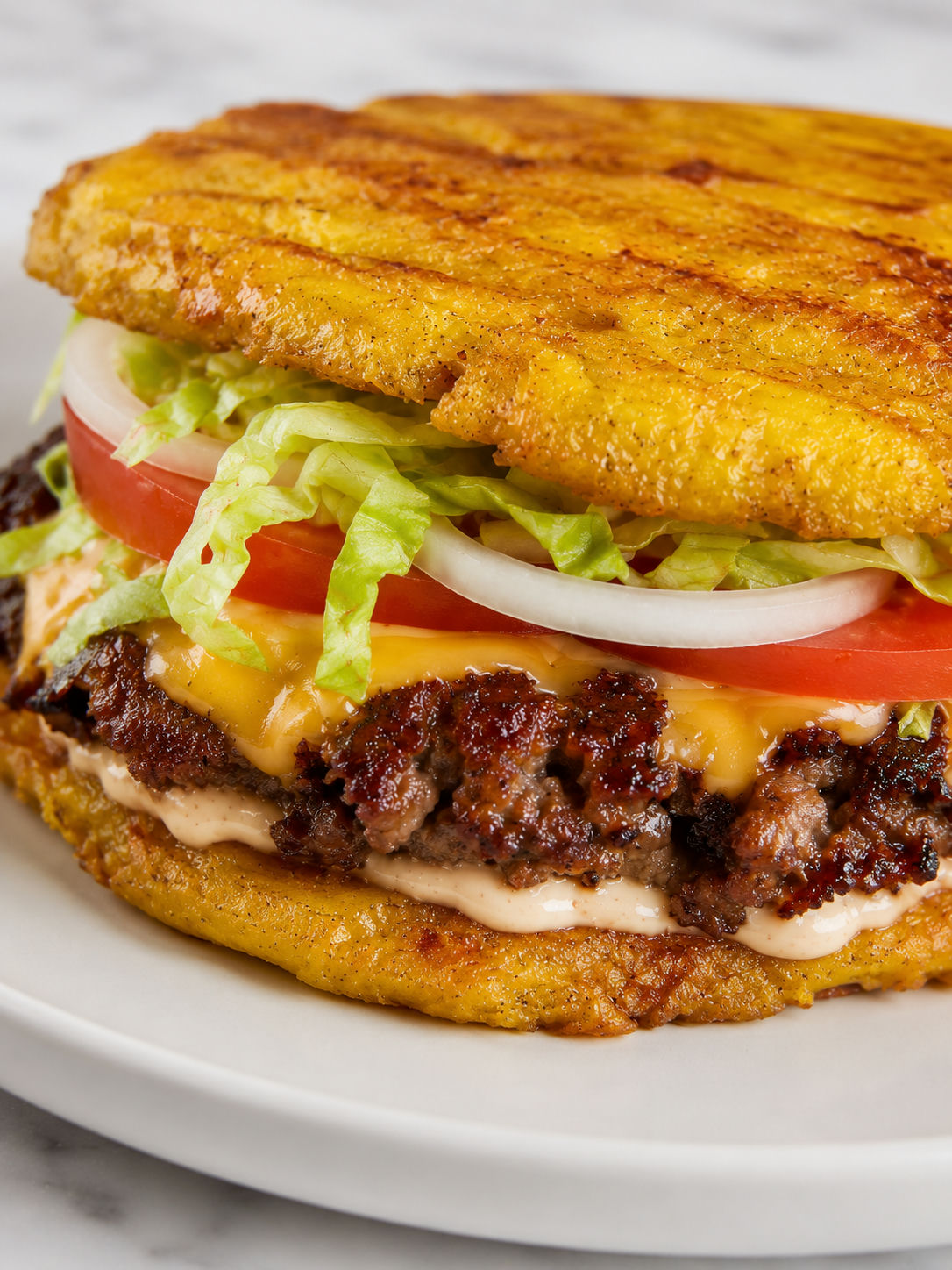 Stacked Chicago jibarito smash sandwich with crisp plantain buns