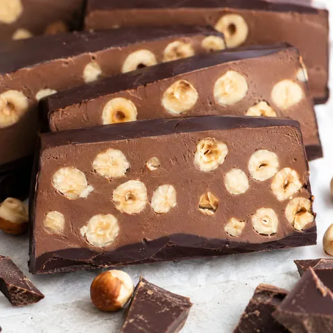 Triple chocolate hazelnut torrone slices with toasted hazelnuts