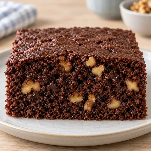 Chocolate sheet cake with coffee and walnuts