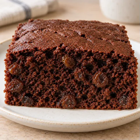 Chocolate sheet cake with vanilla and raisins