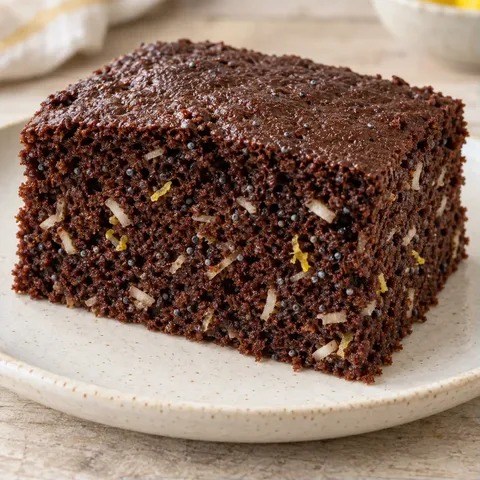 Chocolate sheet cake with lemon and poppy seeds — coconut