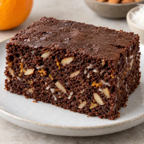 Chocolate sheet cake with orange and almonds — coconut