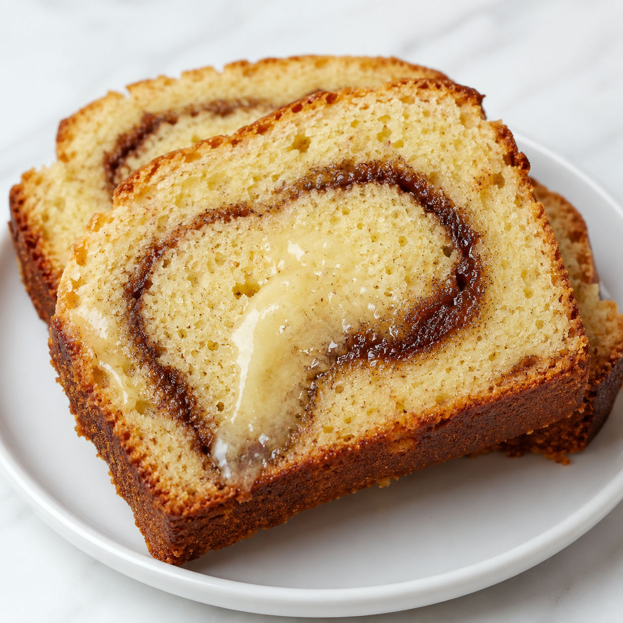 Sliced Keto Cinnamon Bread with a buttery cinnamon swirl